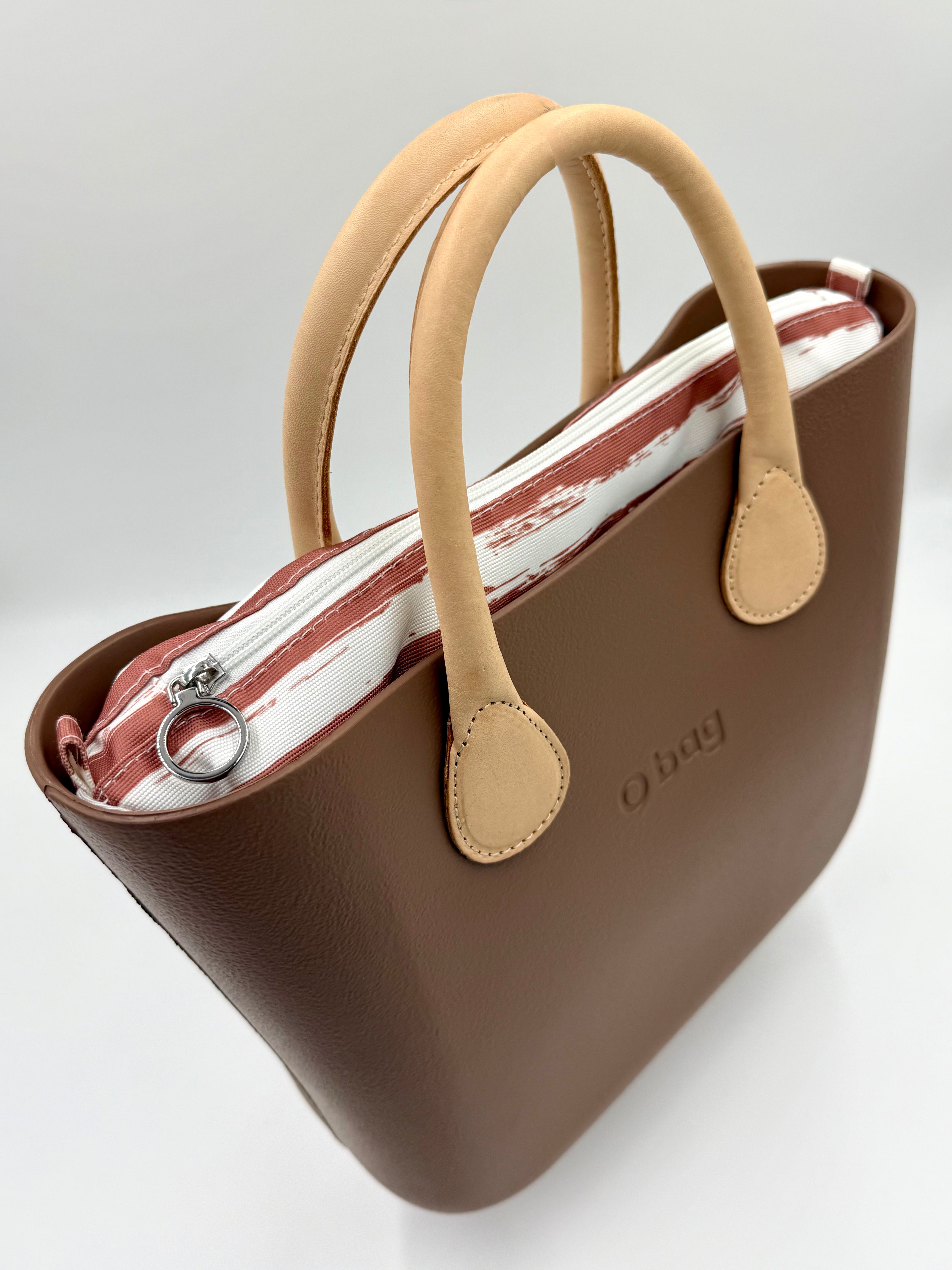 O bag Mini – taupe (greige) handbag with cream handles, striped zippered lining